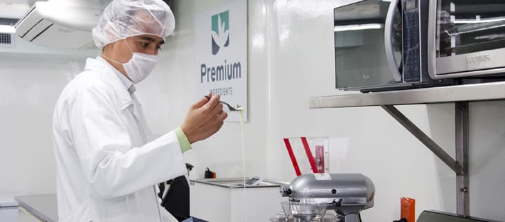 Food formulation laboratory preparing botanical supplement ingredients